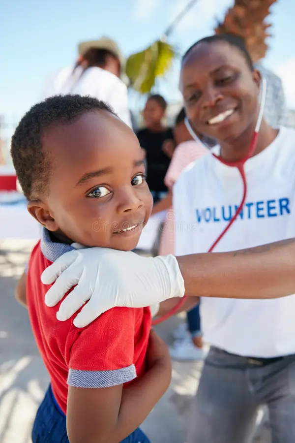 happiness starts good health volunteer doctor examining young patient stethoscope charity event happiness 265160219